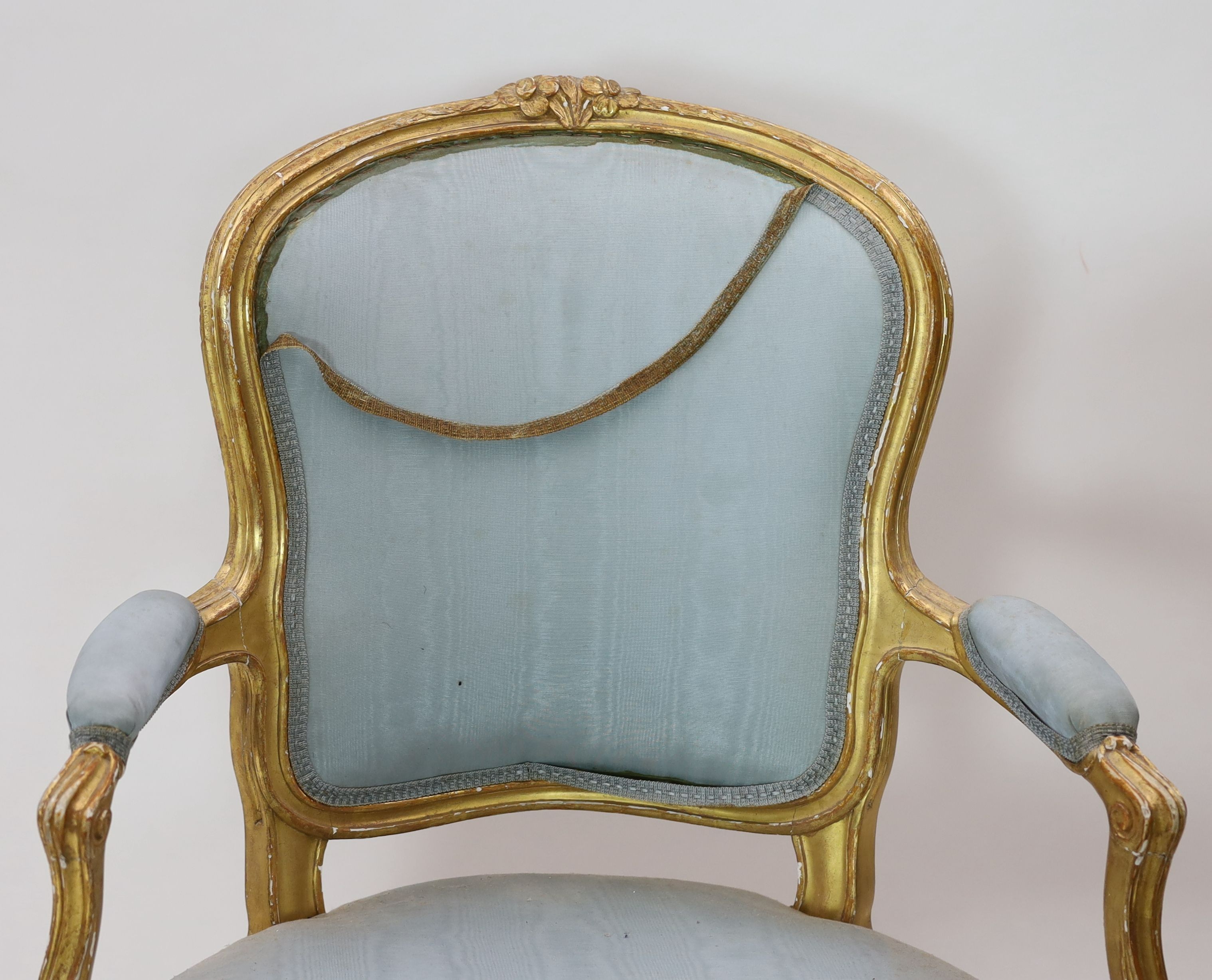 A set of four Louis XVI carved giltwood fauteuils, W.65cm D.62cm H.93cm